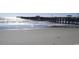 Picturesque scenery of the beach and pier on a clear day offering scenic views and recreational opportunities at 352 Magnolia Terrace Dr, Myrtle Beach, SC 29579