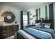 Stylish bedroom with a nautical theme and blue accents at 352 Magnolia Terrace Dr, Myrtle Beach, SC 29579