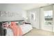 Bright bedroom featuring a daybed, natural light, and access to the outdoors at 352 Magnolia Terrace Dr, Myrtle Beach, SC 29579