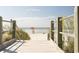 Inviting boardwalk leads to a picturesque beach, perfect for relaxing and enjoying coastal views at 352 Magnolia Terrace Dr, Myrtle Beach, SC 29579
