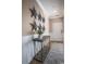 Hallway features starfish decor and a wood console table creating a beach-themed space at 352 Magnolia Terrace Dr, Myrtle Beach, SC 29579
