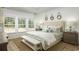 Serene main bedroom with a comfortable bed, natural light, and stylish decor at 352 Magnolia Terrace Dr, Myrtle Beach, SC 29579