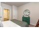 Bedroom featuring a teal dresser, decorative mirror and doorway to another room at 380 Rookroost Circle, Conway, SC 29526