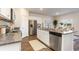 Well-equipped kitchen features stainless steel appliances, granite counters, and a kitchen island at 380 Rookroost Circle, Conway, SC 29526