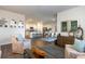Bright open-concept living area featuring stylish decor connecting living room, kitchen, and dining area at 380 Rookroost Circle, Conway, SC 29526