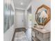 Inviting entryway with a stylish console table, decorative mirror, and elegant artwork on the wall at 384 Rookroost Circle, Conway, SC 29526
