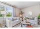 Comfortable living room with neutral tones, bright natural light, and comfortable seating at 384 Rookroost Circle, Conway, SC 29526