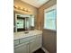 Bright bathroom with vanity and sink with a well-lit mirror and medicine cabinet at 3863 Stern Dr., Conway, SC 29526