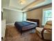 Cozy bedroom features a comfortable bed and two sunny windows perfect for relaxation at 3863 Stern Dr., Conway, SC 29526