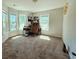 This bedroom features natural light from the windows and comfortable carpet at 3863 Stern Dr., Conway, SC 29526