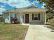 Charming single-story home with a welcoming front porch and well-maintained lawn at 3863 Stern Dr., Conway, SC 29526