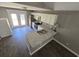 Well-designed kitchen with granite countertops and stainless steel appliances and exterior access at 3863 Stern Dr., Conway, SC 29526