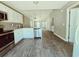 Modern kitchen featuring stainless steel appliances and ample counter space with light wood-look flooring at 3863 Stern Dr., Conway, SC 29526