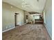 Spacious living room featuring a ceiling fan and open access to the kitchen area at 3863 Stern Dr., Conway, SC 29526