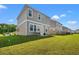 Backyard featuring lawn and patio at 3968 Hibiscus Dr., Little River, SC 29566