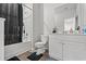 Clean bathroom featuring shower, toilet and sink at 3968 Hibiscus Dr., Little River, SC 29566