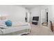 Serene bedroom with plush carpet, decorative pillows, and convenient access to a walk-in closet at 3968 Hibiscus Dr., Little River, SC 29566