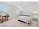 Comfortable bedroom with a simple bed, light carpet, and natural light at 3968 Hibiscus Dr., Little River, SC 29566