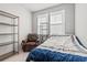 Comfortable bedroom featuring natural light and leather chair at 3968 Hibiscus Dr., Little River, SC 29566