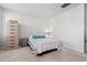 Cozy bedroom featuring neutral tones, a comfortable bed, and ample storage space at 3968 Hibiscus Dr., Little River, SC 29566