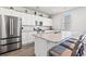 Bright kitchen featuring stainless steel appliances, white cabinets, and granite counters at 3968 Hibiscus Dr., Little River, SC 29566