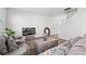 Neutral living room featuring wood flooring, comfortable seating, and simple accents at 3968 Hibiscus Dr., Little River, SC 29566
