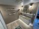 The bathroom includes a granite countertop, decor shelves and unique lighting at 417 South Dunes Dr. # B16, Pawleys Island, SC 29585