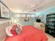 This bedroom offers a ceiling fan, beachy decor, and lots of sunlight at 417 South Dunes Dr. # B16, Pawleys Island, SC 29585