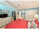 This bedroom view shows a dresser, closet and attached bathroom at 417 South Dunes Dr. # B16, Pawleys Island, SC 29585