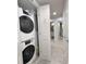 Hallway featuring a washer/dryer, and access to a full bathroom at 417 South Dunes Dr. # B16, Pawleys Island, SC 29585