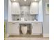 Chic home office area with built-in cabinets, a stylish stool, and decorative mosaic tile backsplash at 417 South Dunes Dr. # B16, Pawleys Island, SC 29585