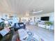Spacious living room featuring modern decor, ample seating, and a bright, open atmosphere at 417 South Dunes Dr. # B16, Pawleys Island, SC 29585