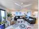Bright living room featuring comfortable seating, natural light, and stylish decor at 417 South Dunes Dr. # B16, Pawleys Island, SC 29585