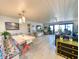 Open living space with stylish dining area, seamless transition to kitchen, and plenty of natural light at 417 South Dunes Dr. # B16, Pawleys Island, SC 29585