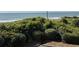 Gorgeous view of greenery and the ocean from the balcony at 417 South Dunes Dr. # B16, Pawleys Island, SC 29585