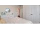 Bedroom featuring a decorative mirror, white dresser and bed at 418 Glade Ct., Loris, SC 29569