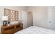 A neutral bedroom features a decorative wood table with accent lamp and decorative items at 418 Glade Ct., Loris, SC 29569