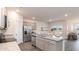 Open-concept kitchen featuring stainless appliances, granite counters, and an island perfect for casual dining at 418 Glade Ct., Loris, SC 29569