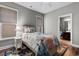 Bedroom with decorative rug and comforter with an ensuite bathroom, creating a comfortable private retreat at 4311 Grovecrest Circle, North Myrtle Beach, SC 29582