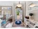 Bright foyer with tile flooring, decorative console table, and a view to the front yard at 4311 Grovecrest Circle, North Myrtle Beach, SC 29582
