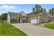 Charming home with a well-manicured lawn and attractive curb appeal at 4311 Grovecrest Circle, North Myrtle Beach, SC 29582