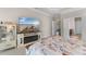 Main bedroom featuring a fireplace and a mounted TV at 4311 Grovecrest Circle, North Myrtle Beach, SC 29582