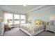 Comfortable bedroom with large windows, tray ceiling and stylish furniture at 435 Clear Lake Dr., Conway, SC 29526