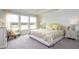 Comfortable bedroom with large windows, tray ceiling and stylish furniture at 435 Clear Lake Dr., Conway, SC 29526