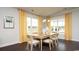 Elegant dining room with stylish yellow curtains and a chandelier at 435 Clear Lake Dr., Conway, SC 29526