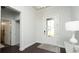 Clean entryway with hardwood floors, view of a tiled bathroom and a glass panel front door at 435 Clear Lake Dr., Conway, SC 29526