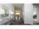 Inviting entryway boasting hardwood floors with views of the living room, with gray walls and white trim at 435 Clear Lake Dr., Conway, SC 29526