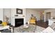 Bright living room with a fireplace, stylish decor, and open access to the kitchen area at 435 Clear Lake Dr., Conway, SC 29526