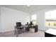 Bright office with desk, chair, storage, and a view from the large windows at 435 Clear Lake Dr., Conway, SC 29526