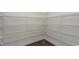 Walk-in pantry with ample white shelving for organized storage at 435 Clear Lake Dr., Conway, SC 29526